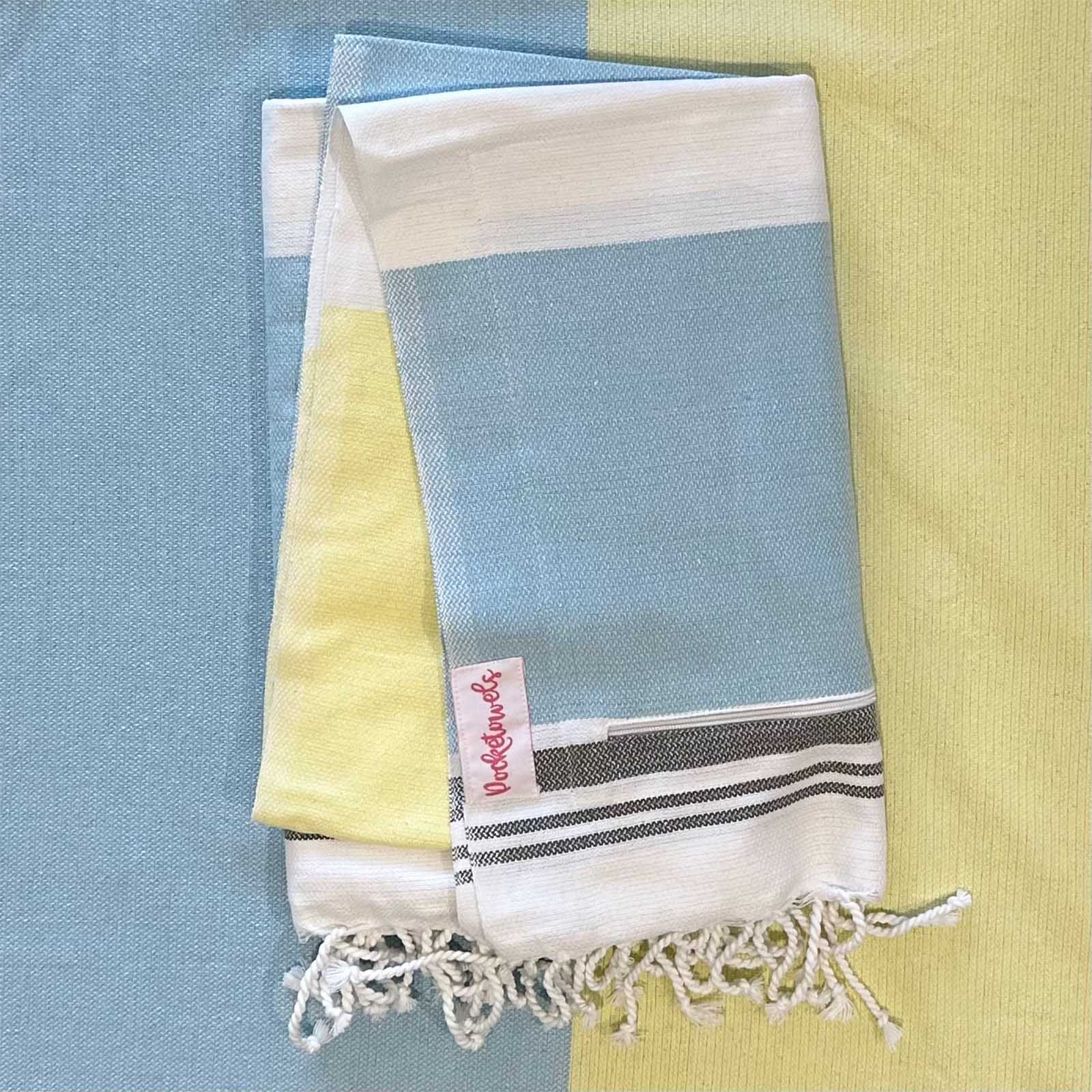 Agatti Pocketowel folded - this is a large beach towel with pocket that folds up small, by Freostyle