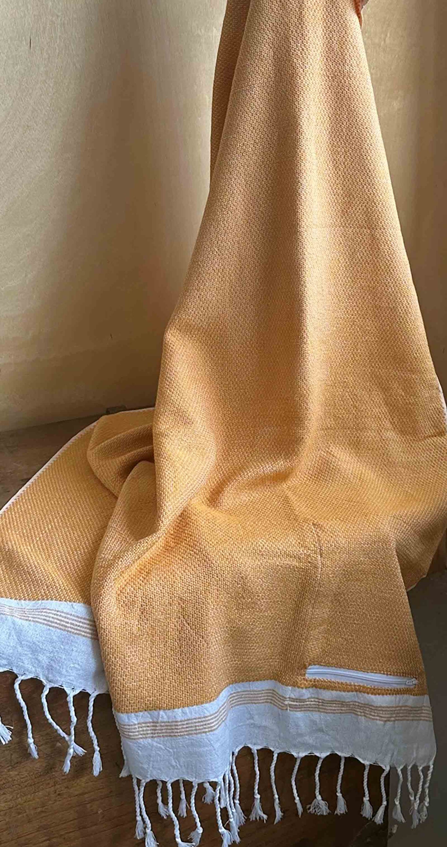 Aure Turkish Towel with Pockets, by Freostyle, displayed