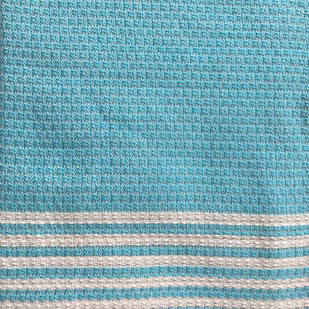 Azure authentic Turkish Towel features a pale turquoise and cream traditional weave across the main body of the towel, with alternating thin turquoise and cream stripes at each end