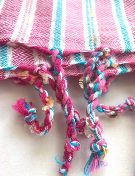Our Berry Turkish Towel has beautiful hand-rolled tassels