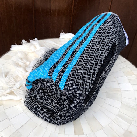 Black Sea Turkish Towel rolls up so small, its a perfect beach towel