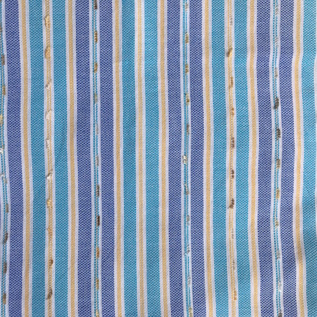 Our Oasis Turkish Towel combines sky-blue, royal-blue, yellow and white vertical stripes with an added layer of texture woven through to add contrast and interest.