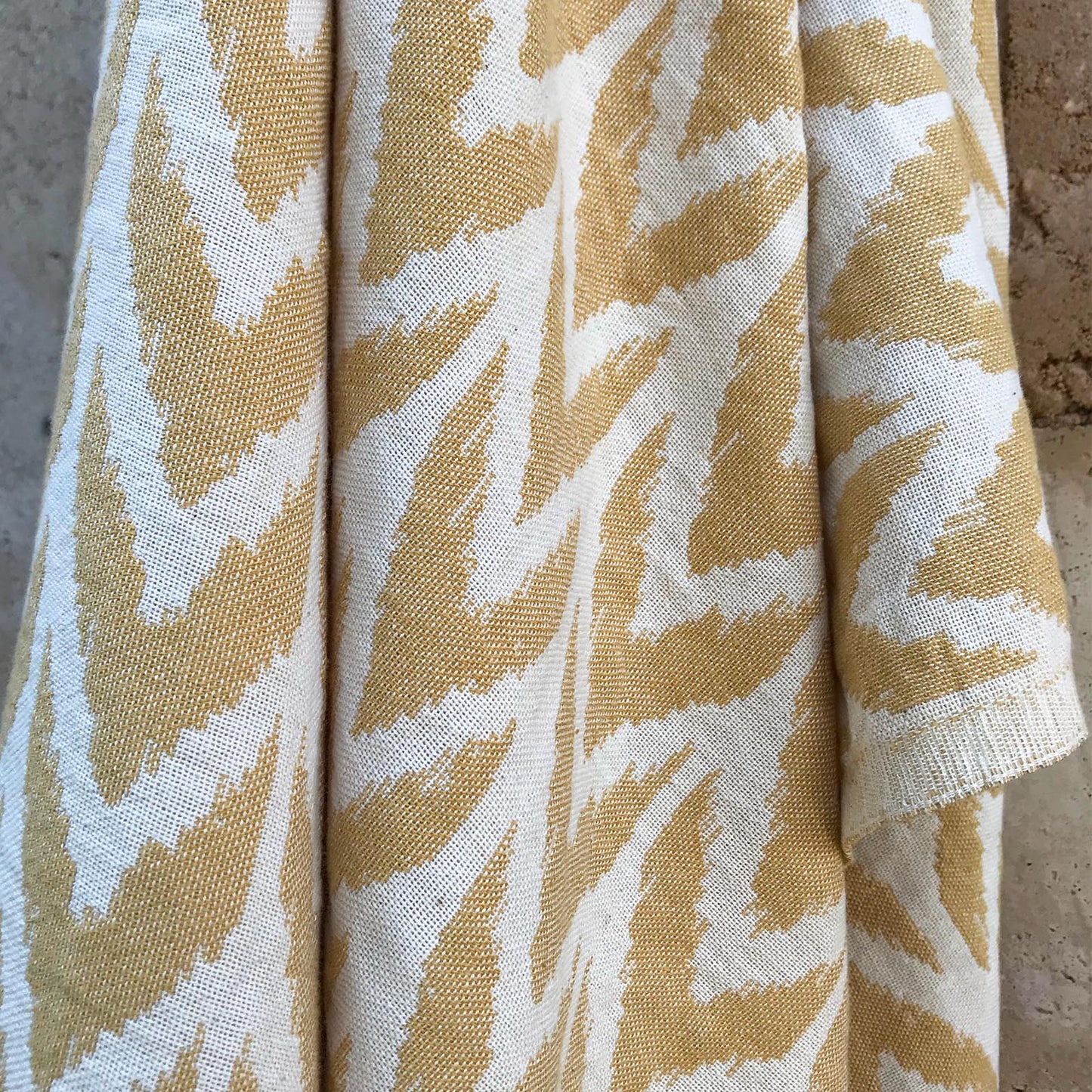 Zanzibar Turkish Towel with Pocket by Freostyle sustainable beach products, hung close up
