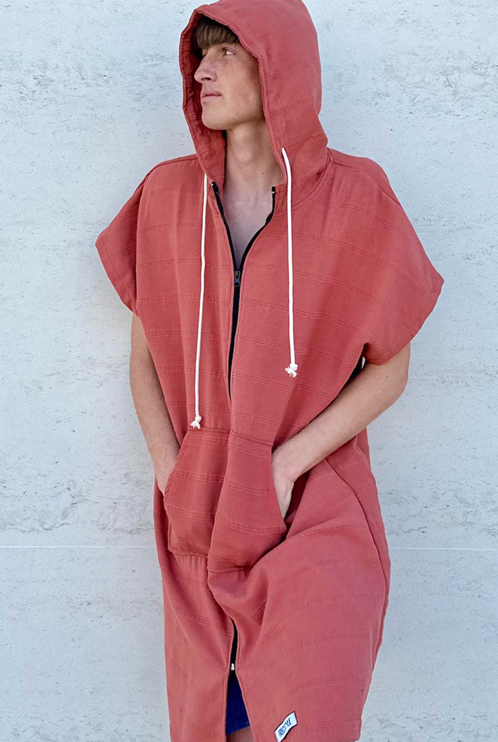 Freostyle Turkish Cotton Surf Poncho, terracotta Colour, worn by tall male teenager