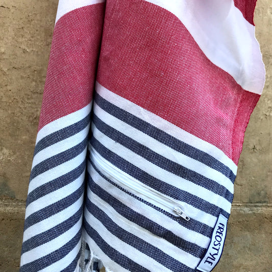 Antibes Turkish Towel with Pockets has a bold red feature stripe for a classic nautical feel