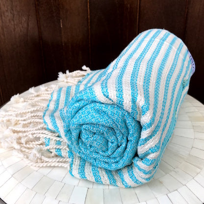 Lightweight and fast-drying, our authentic turkish towels roll up small, so they're perfect for a day at the beach