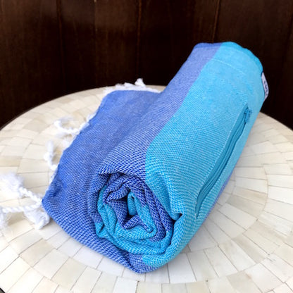 Big Blue Turkish Towel is lightweight and rolls up small, so it's perfect to take to the beach