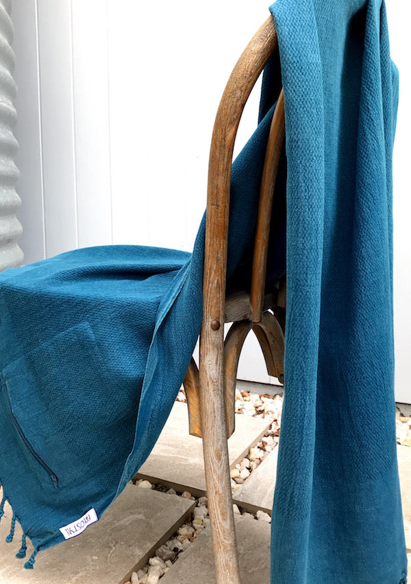 Freostyle Blue Angel indigo Turkish Towel with pocket, displayed