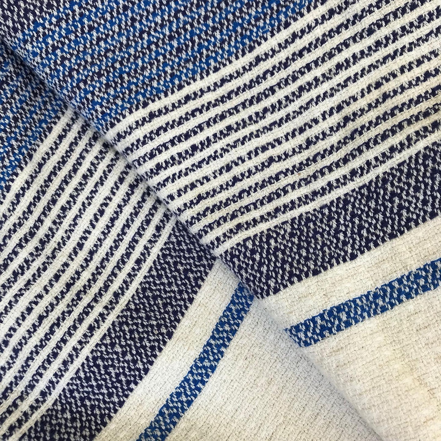 Freostyle sustainable turkish towel with pocket, Oceanus, close up of weave, folded