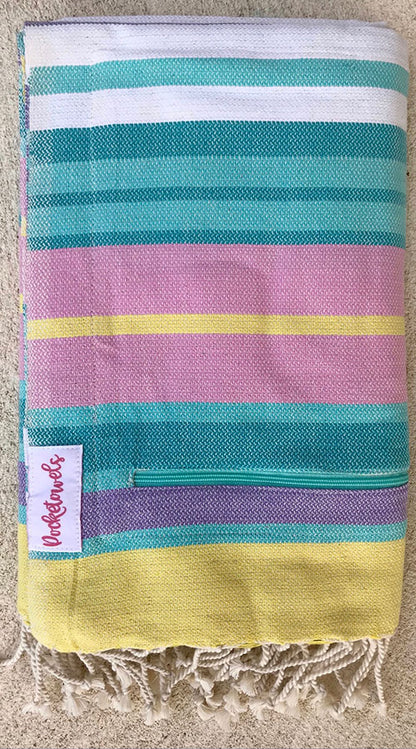 Malabar Pocketowel rocks a pastel stripe for a coastal vibe. Pocketowels are large beach towels with pockets