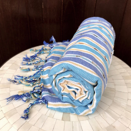 Lightweight & fast-drying, our genuine Turkish Towels roll up so small