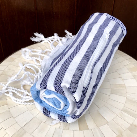 Seafarer turkish towel is the perfect beach towel as it rolls up so small but gives so much coverage