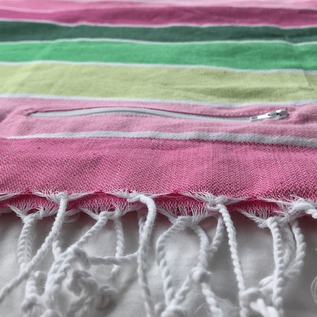 Spring turkish towel has a pocket so it's perfect for a beach towel - with a discreet place to stash your stuff!