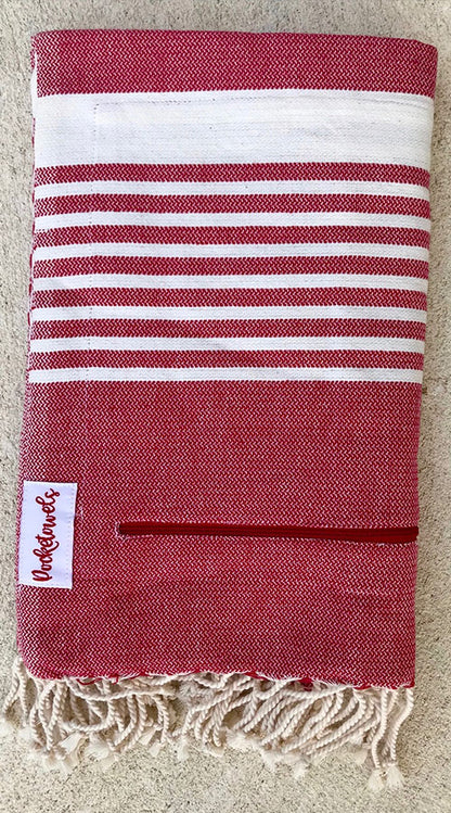 Varkala Pocketowel is Red and White stripe for a coastal vibe. Pocketowels are large beach towels with pockets