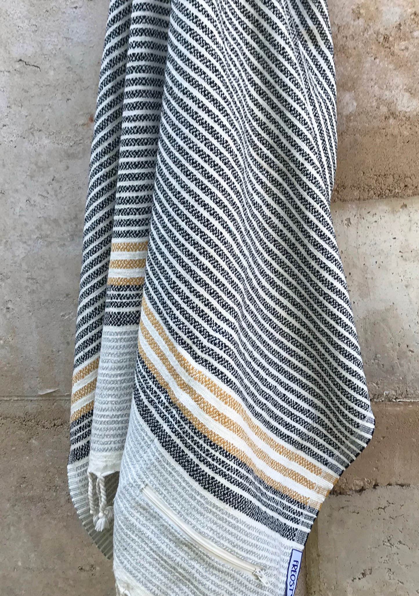 Zante Turkish Towel with Pockets, close up, sustainable bear gear from Freostyle, hung